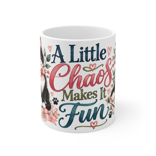 Front view of A Little Chaos Makes It Fun tuxedo cat papercraft ceramic mug