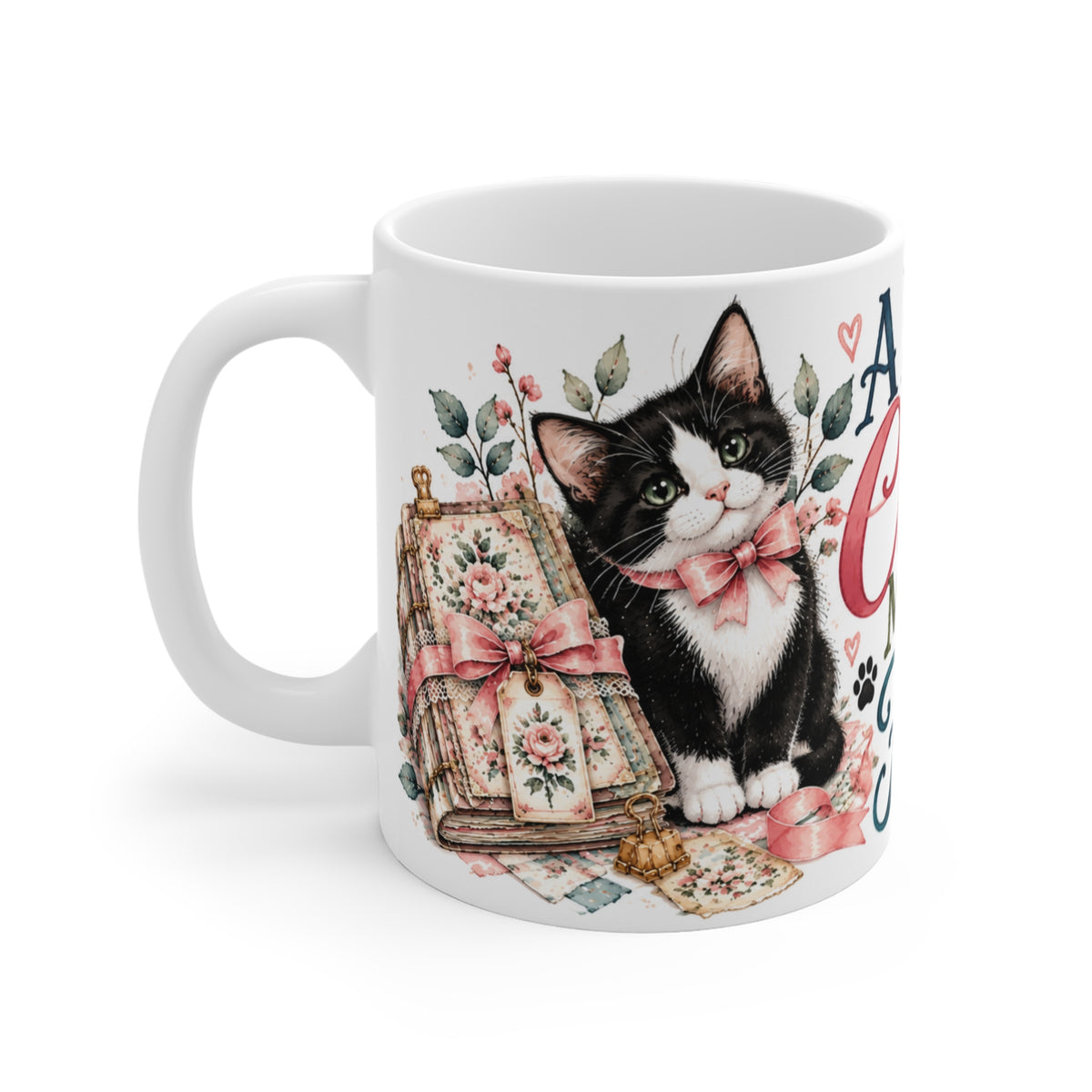 Left side view of A Little Chaos Makes It Fun tuxedo cat papercraft ceramic mug with handmade journal