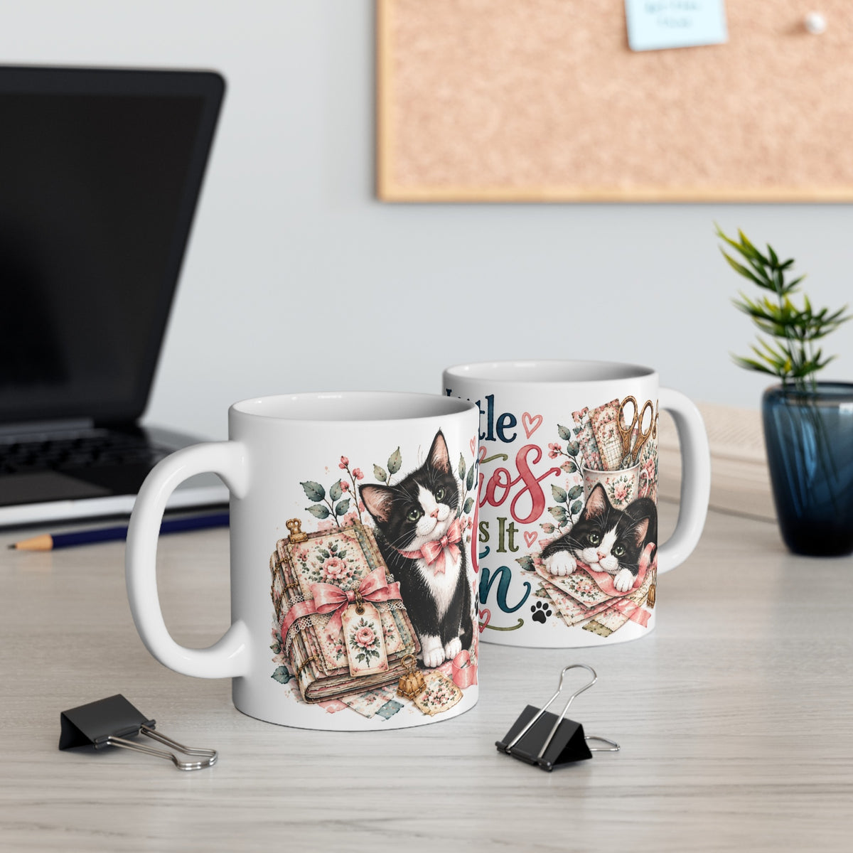 A Little Chaos Makes It Fun tuxedo cat ceramic mug shown from two angles on a desk