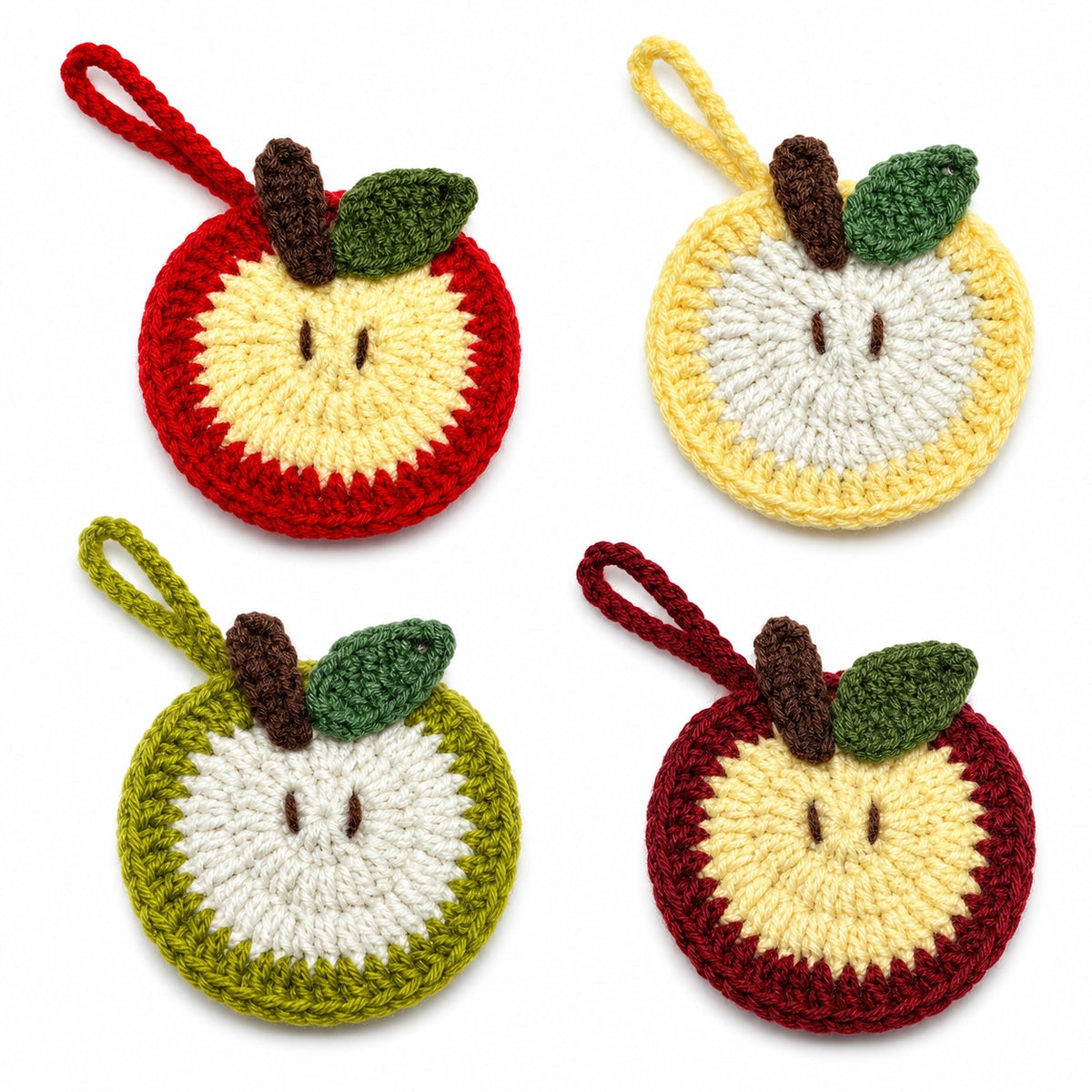 Handmade crochet apple mini pouches in red, yellow, green, and burgundy