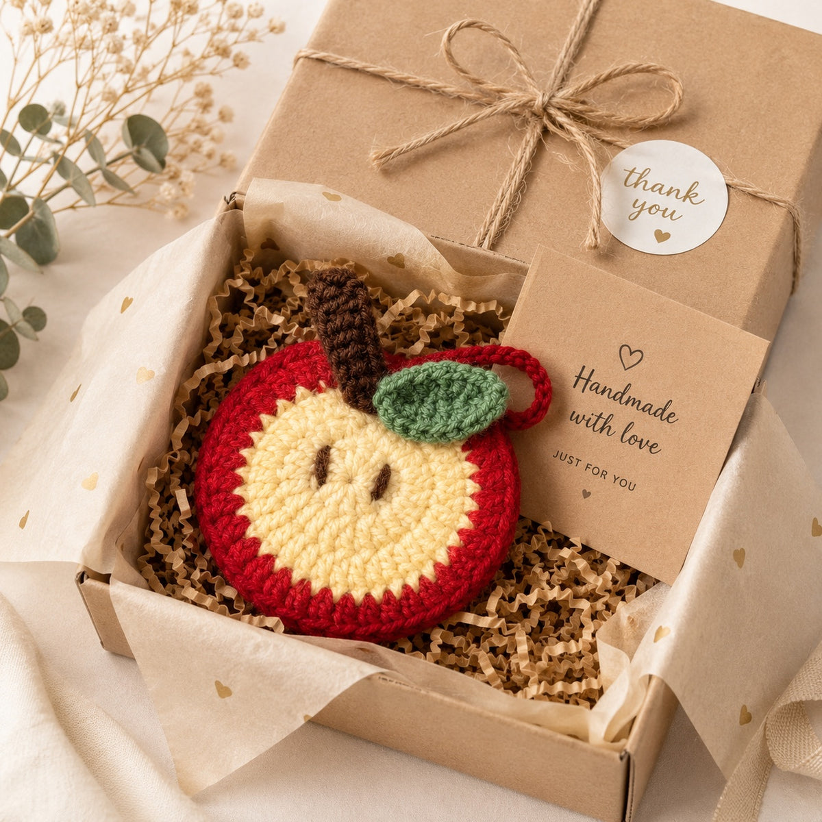 Classic red crochet apple mini pouch in handmade gift packaging