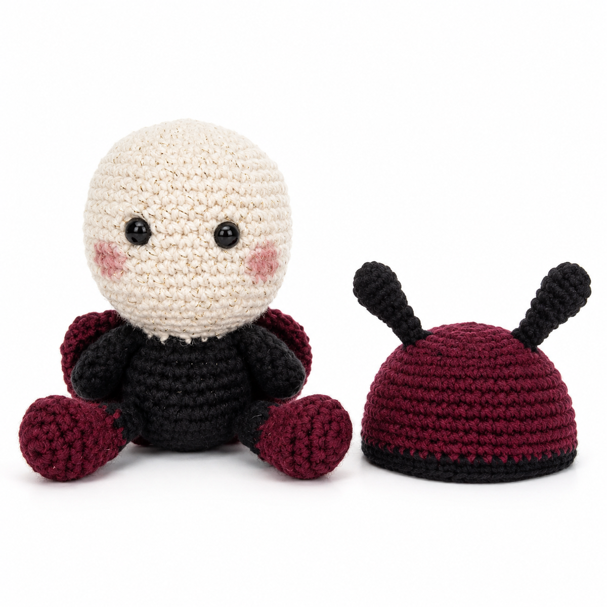 Baby Ladybug plush with removable antenna hat displayed beside it