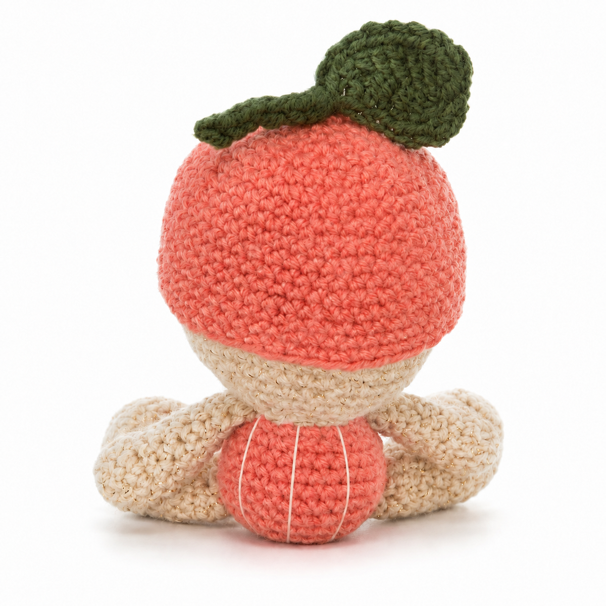 Back view of handmade Baby Orange crochet plush