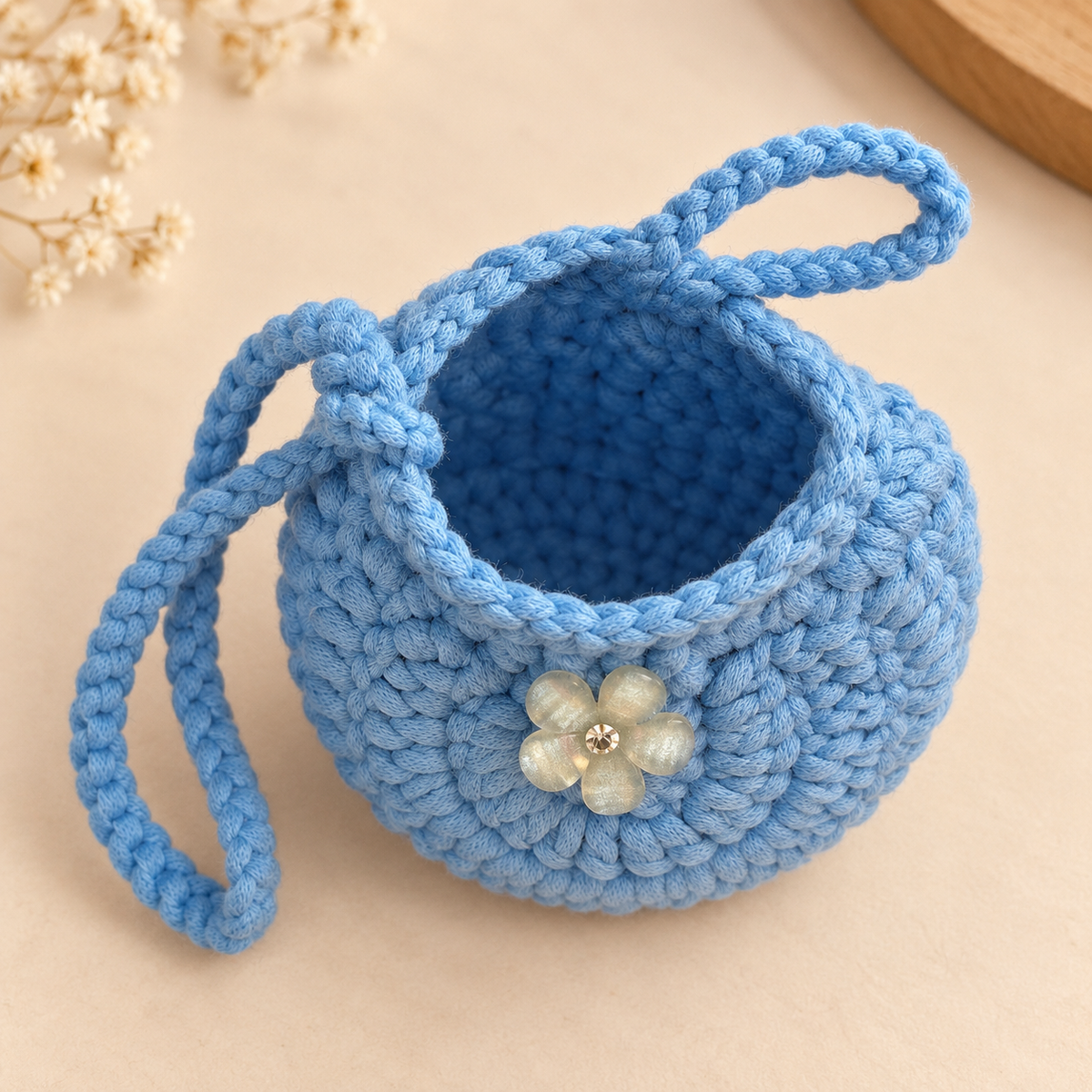 Blue flower button crochet wristlet pouch open interior view