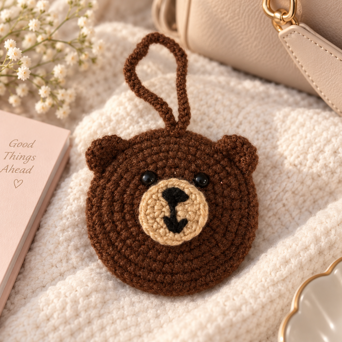 Brown bear crochet pocket mirror charm styled lifestyle view