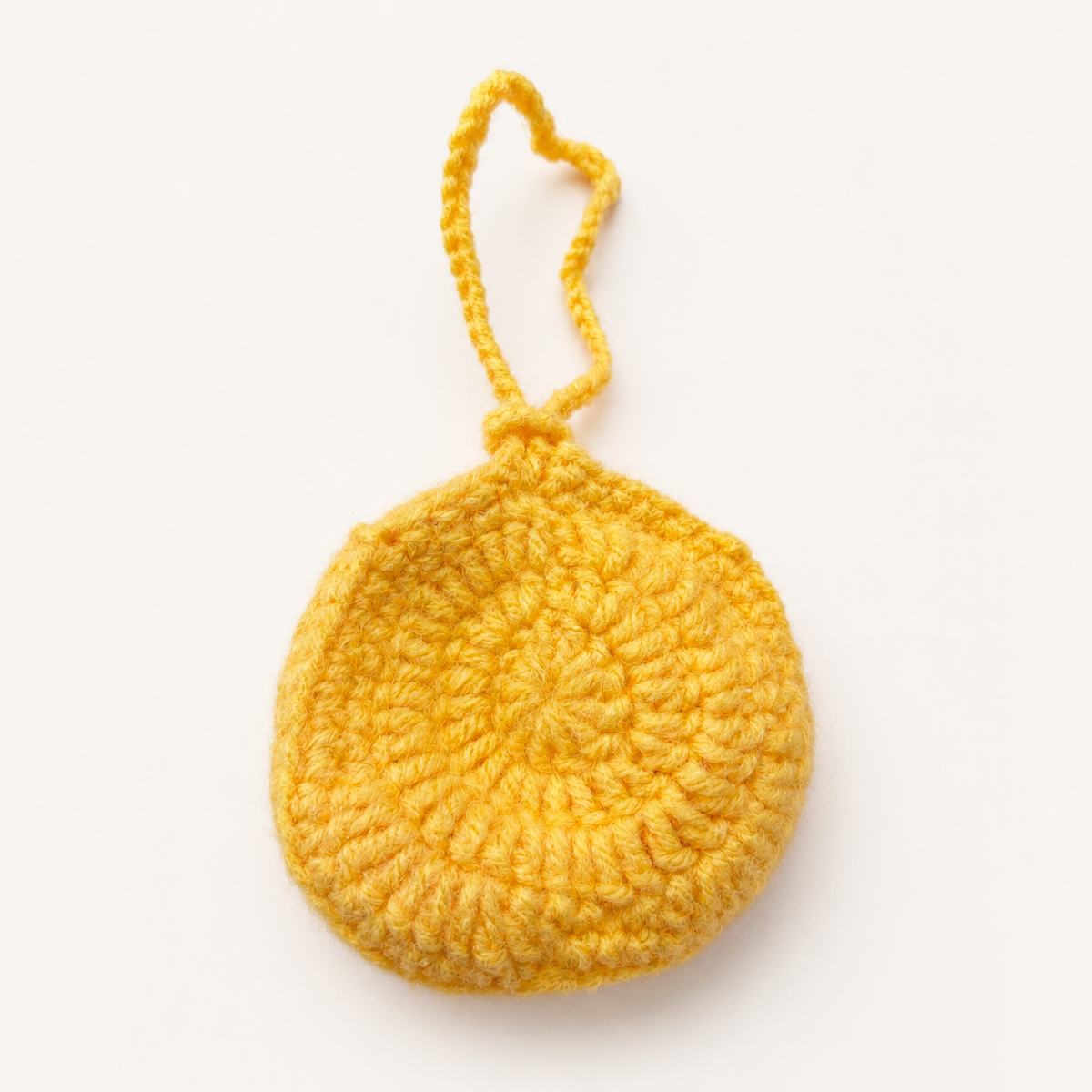 Handmade yellow crochet duck mini pouch back view