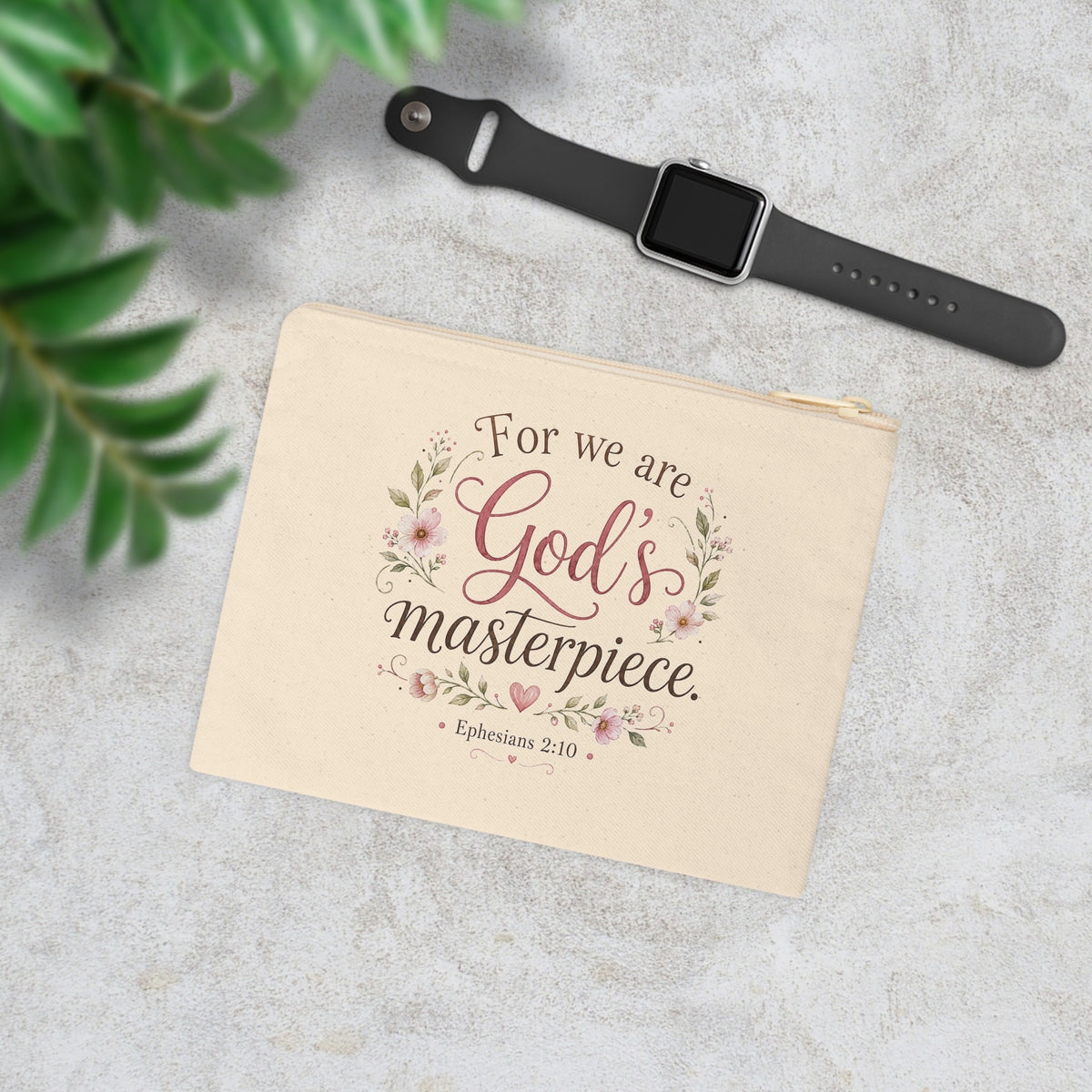 God's Masterpiece Ephesians 2:10 floral canvas pouch in lifestyle setting