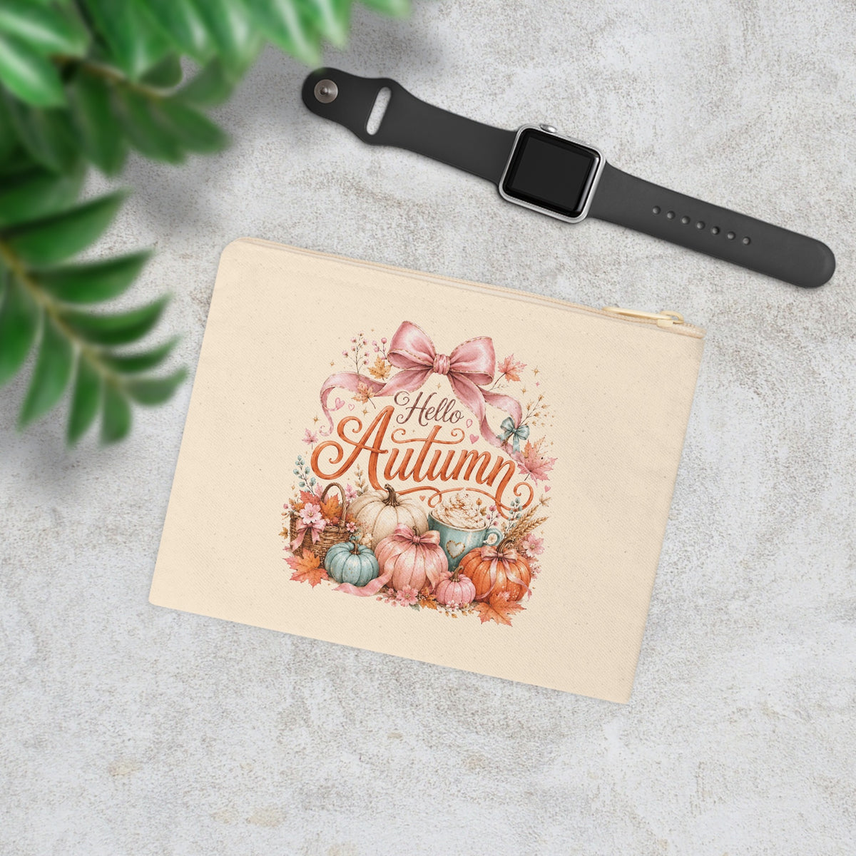 Hello Autumn canvas pouch styled with smartwatch and greenery