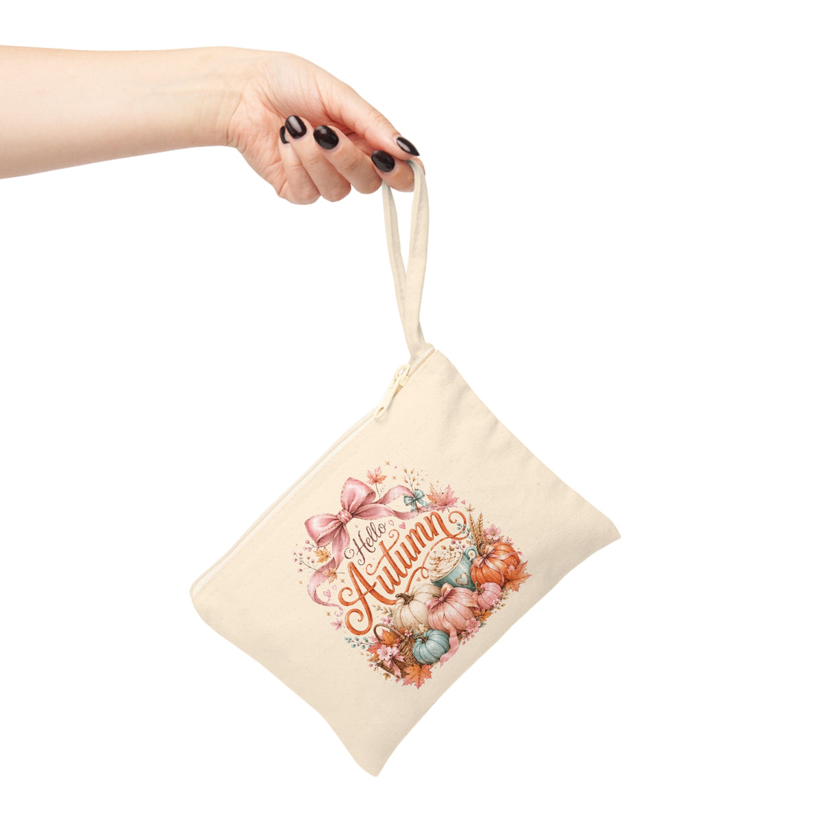 Hello Autumn canvas wristlet pouch hanging from hand