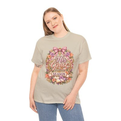 Woman wearing the His Grace for Every Season Christian floral T-shirt in sand