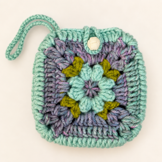 Handmade mint floral crochet pouch with single strap and button closure