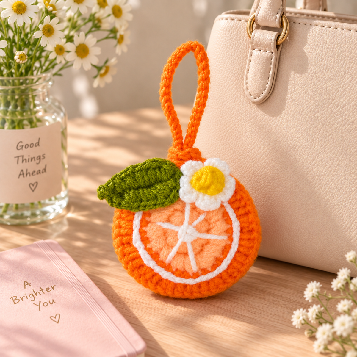 Handmade crochet orange mini pouch lifestyle view