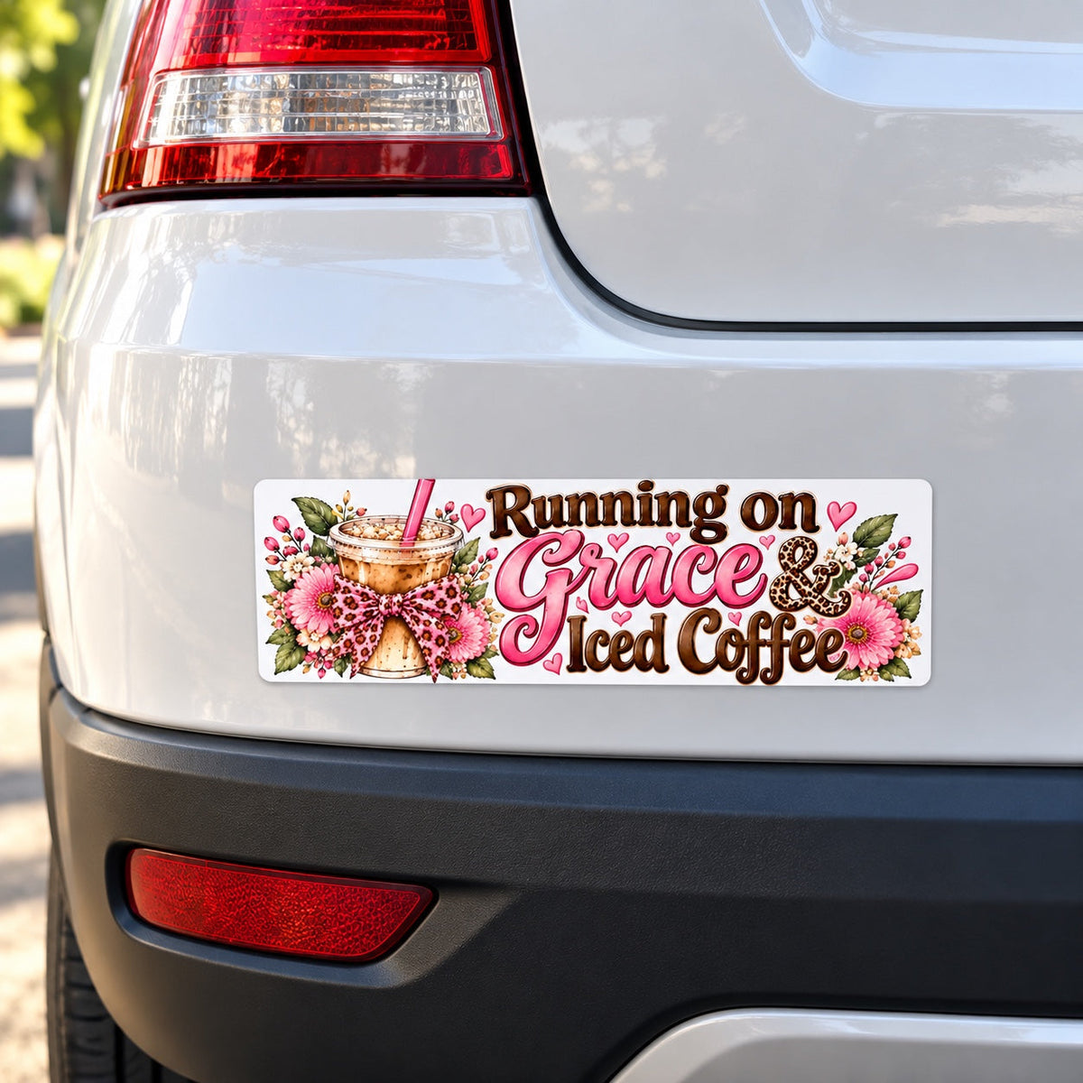 Running on Grace and Iced Coffee bumper sticker on white rear car panel