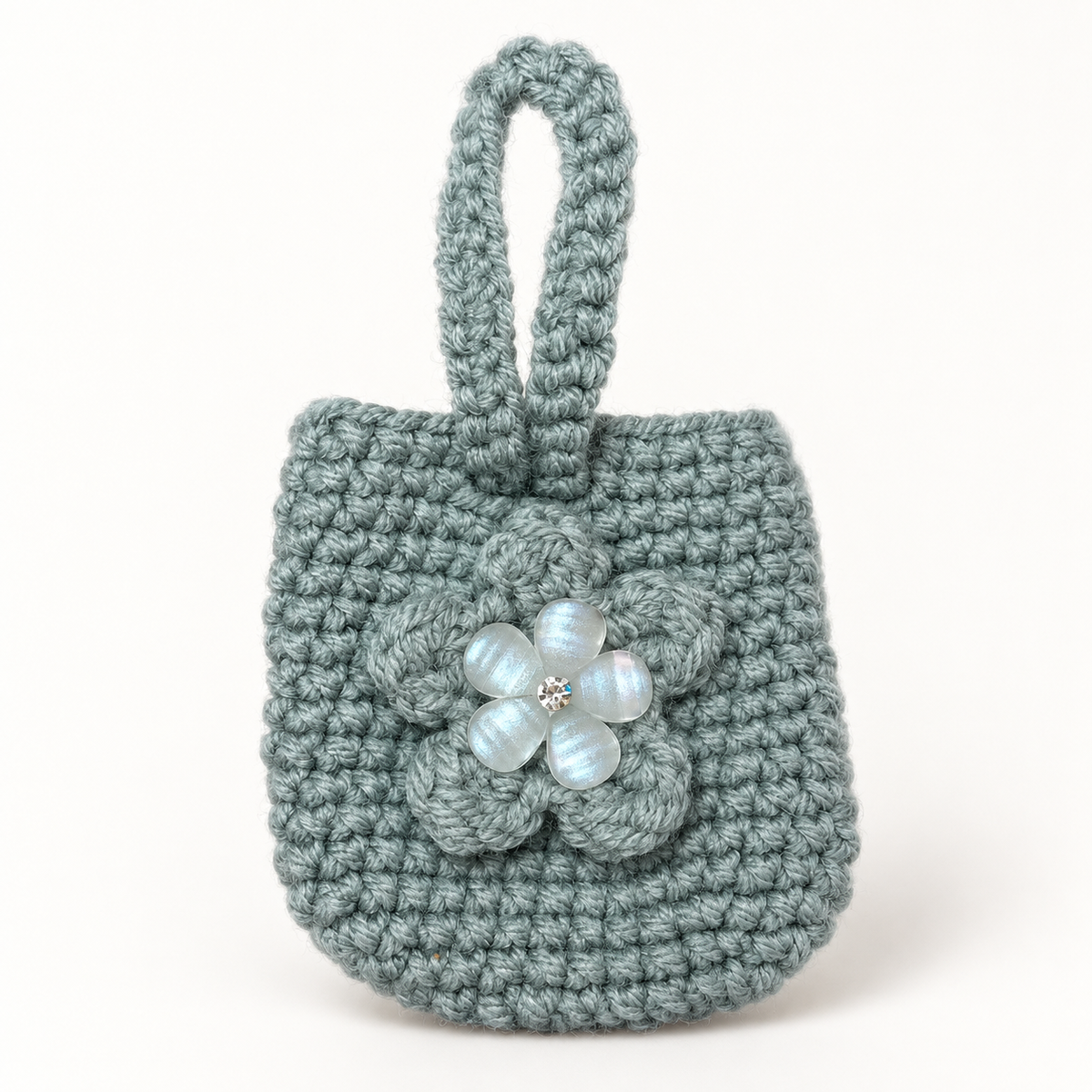 Handmade sage crochet mini wristlet pouch with flower front view