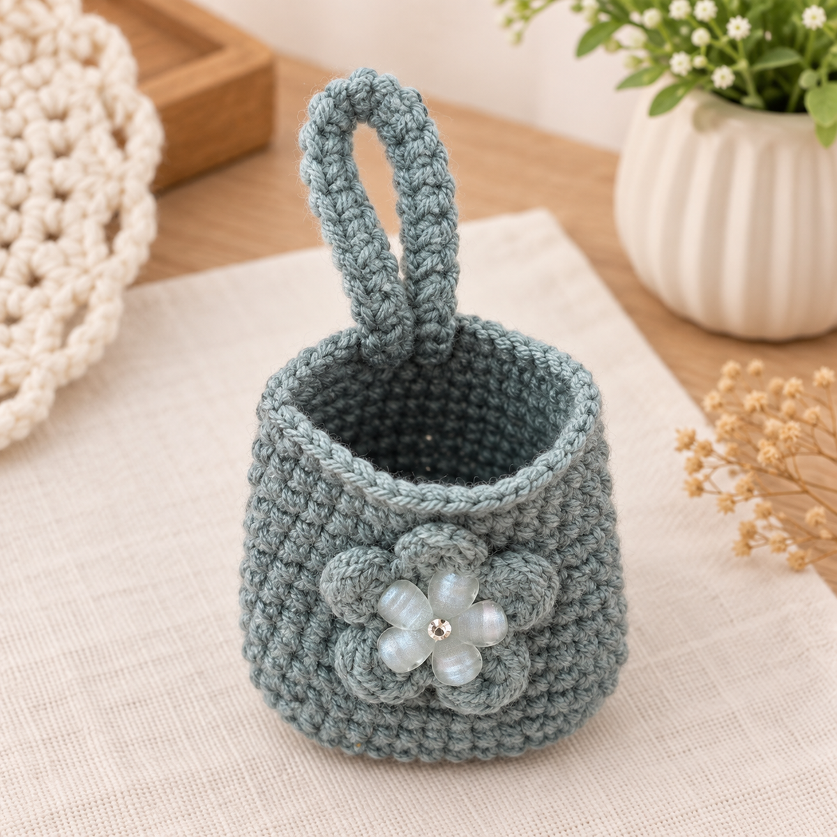 Handmade sage crochet mini wristlet pouch open empty interior