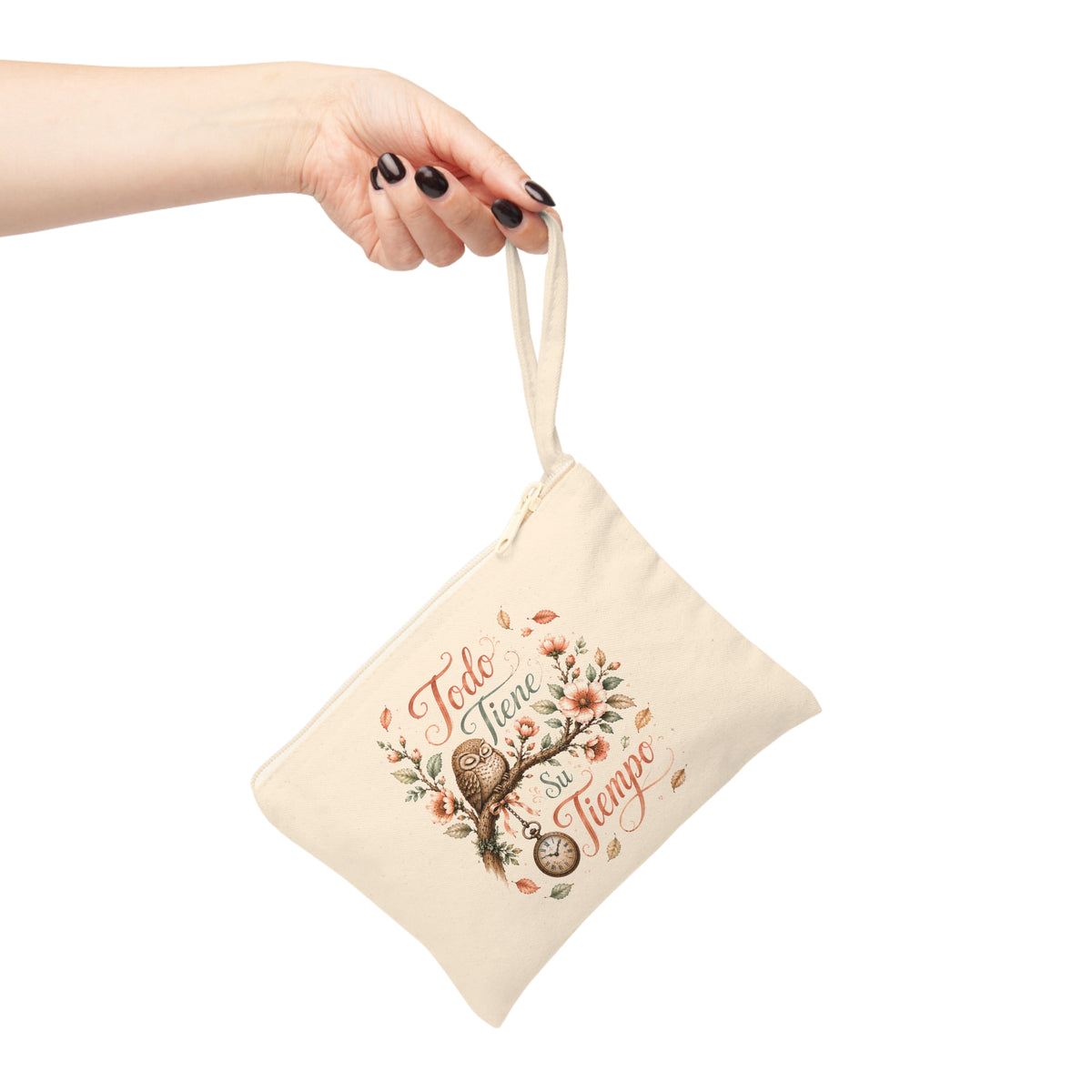 Todo Tiene Su Tiempo canvas pouch shown with wristlet strap